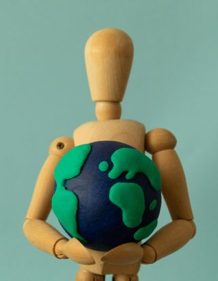 man holding world